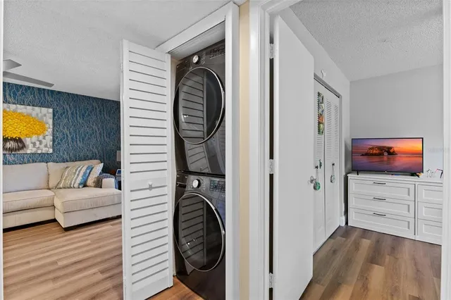 a view of livingroom with furniture and natural light