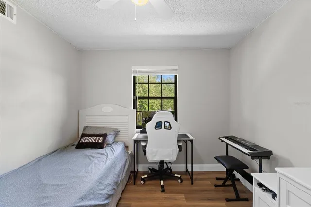 a workspace with furniture and a window