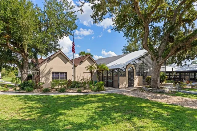 a view of a swimming pool with a patio