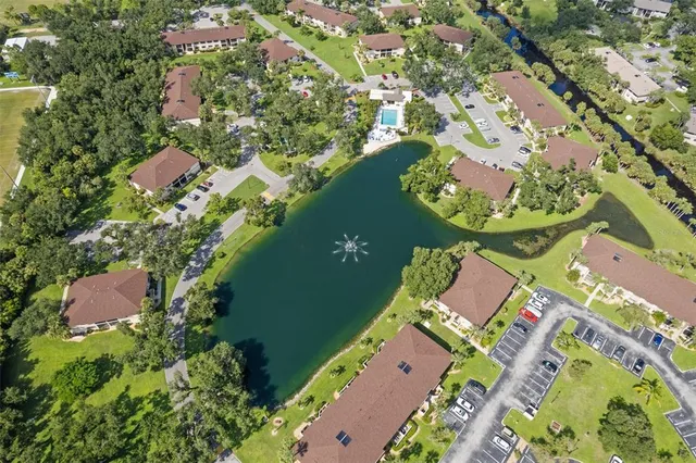 an aerial view of a house with a garden