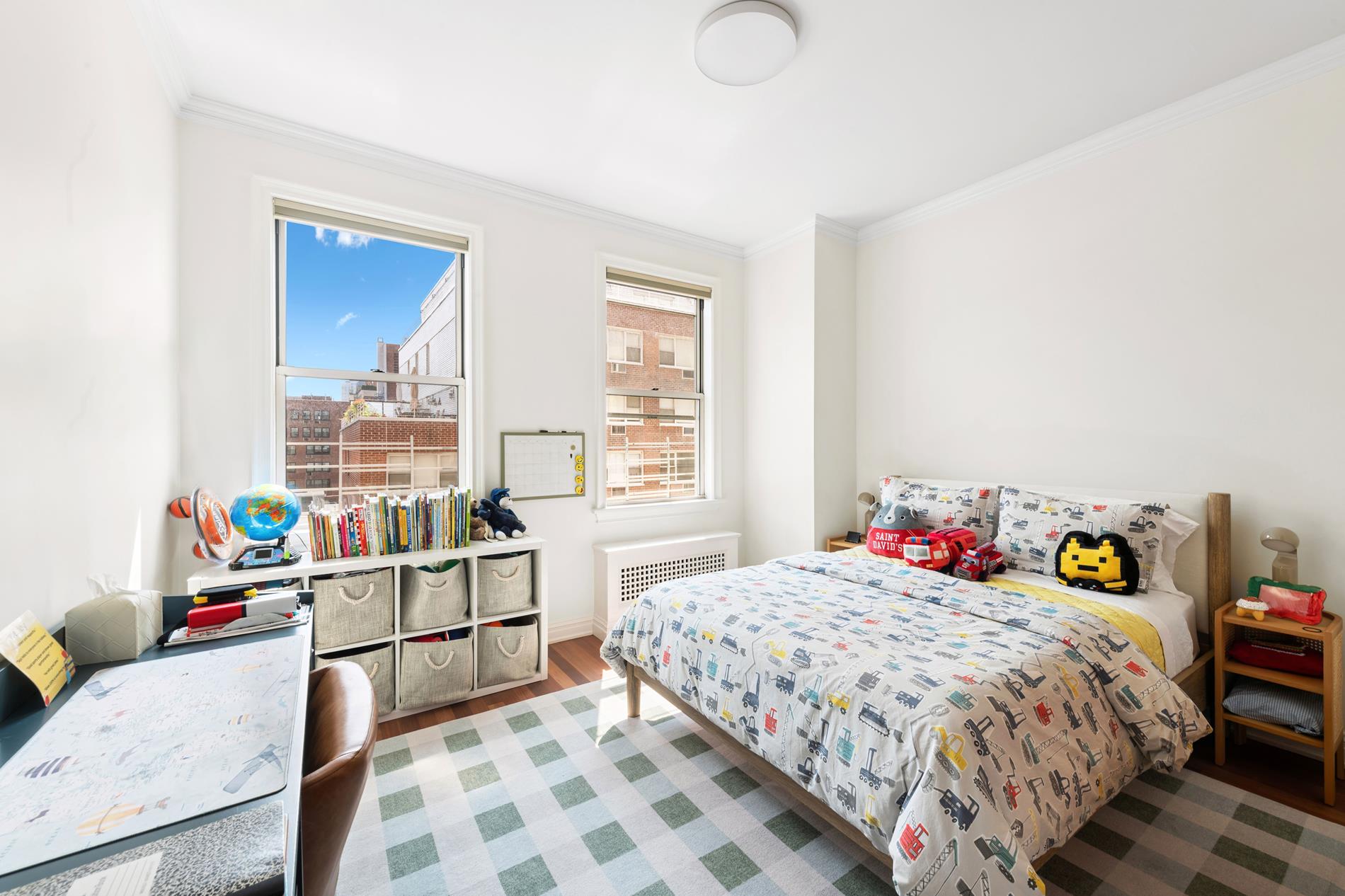 330 East 72nd Street, Unit 9/10 Manhattan, NY 10021 - Photo 12 of 17 a bedroom with a bed and windows