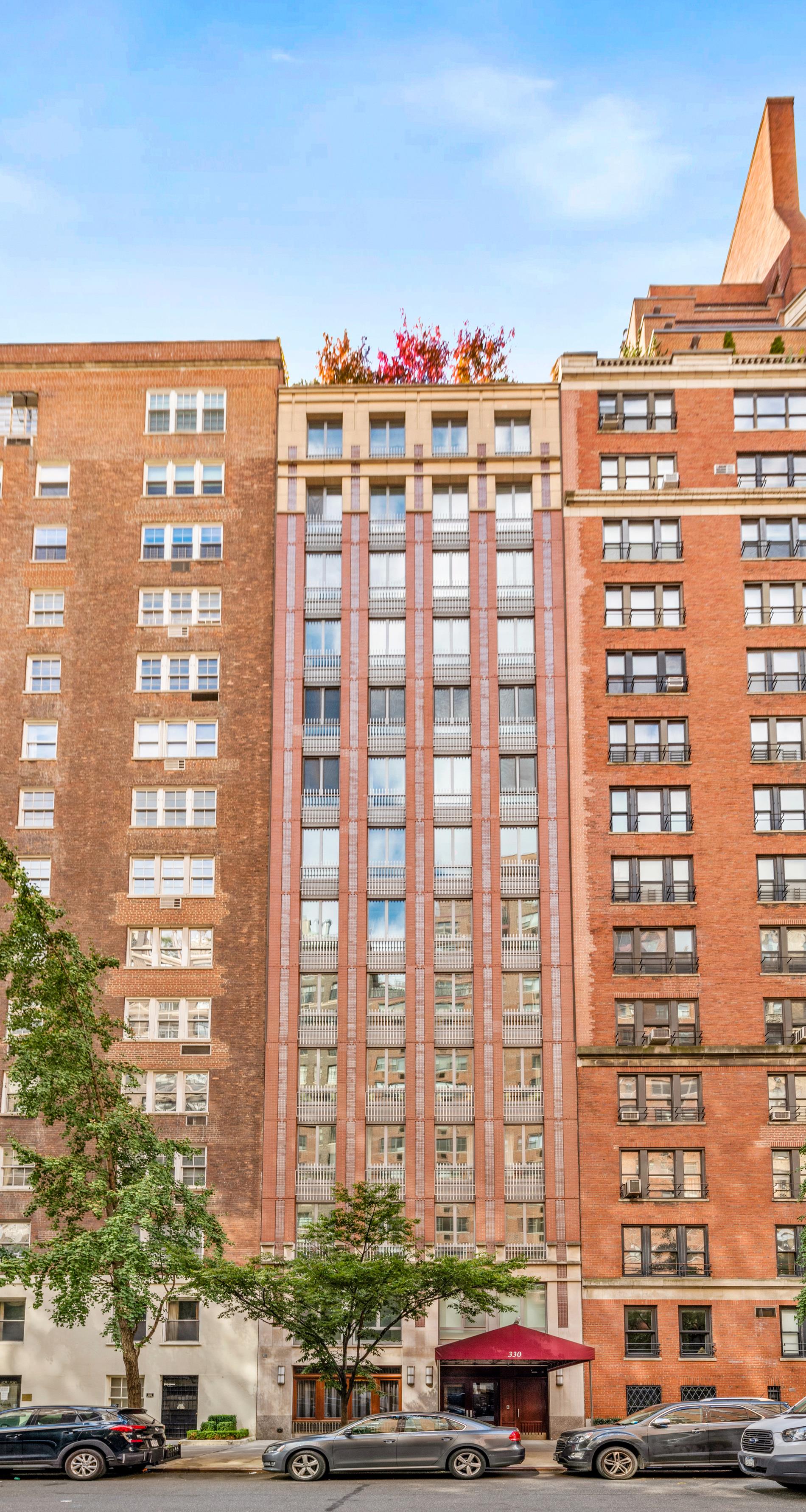 330 East 72nd Street, Unit 9/10 Manhattan, NY 10021 - Photo 15 of 17 a front view of a multi story building
