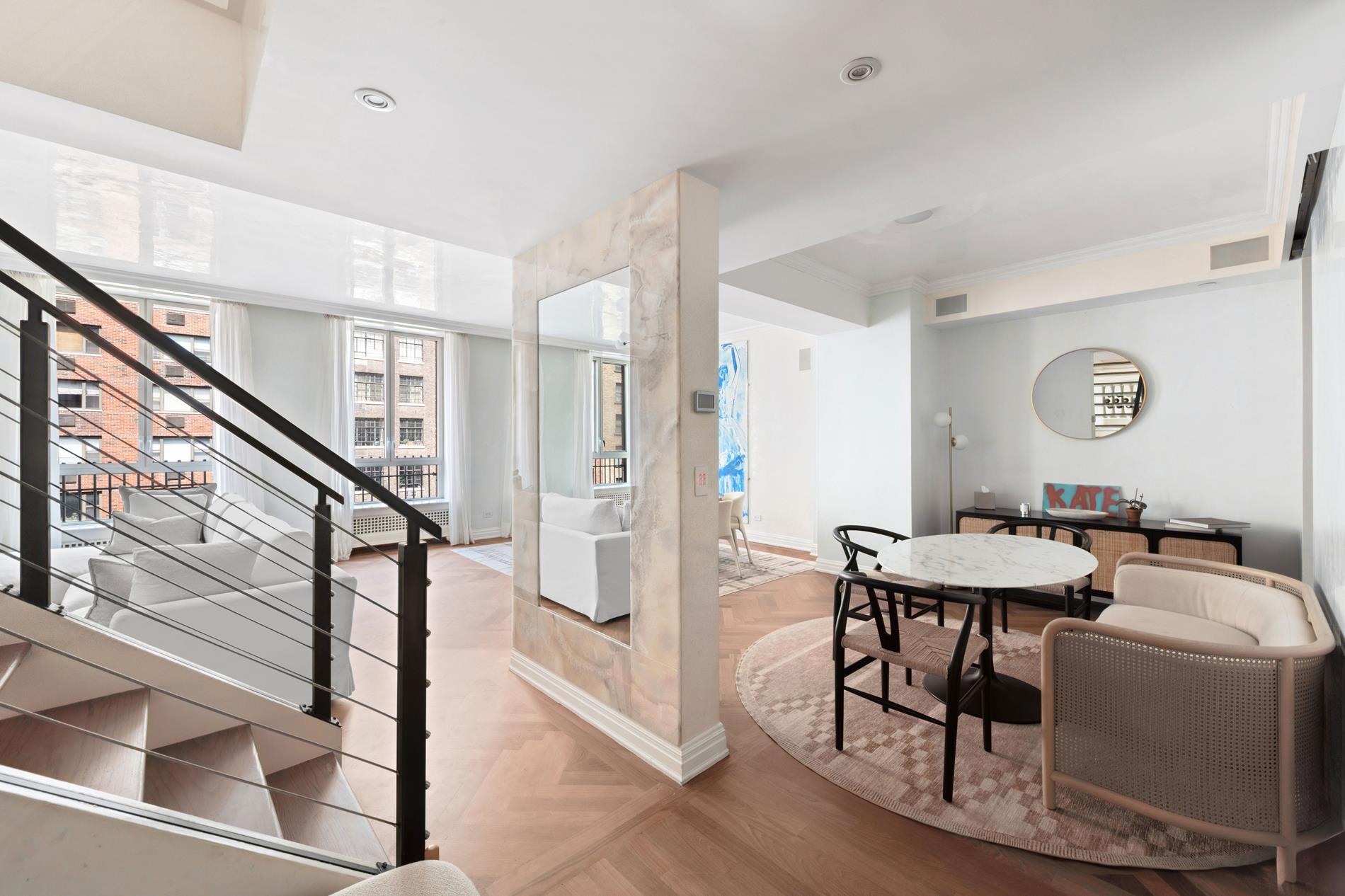 330 East 72nd Street, Unit 9/10 Manhattan, NY 10021 - Photo 3 of 17 a view of a livingroom with furniture and hardwood floor