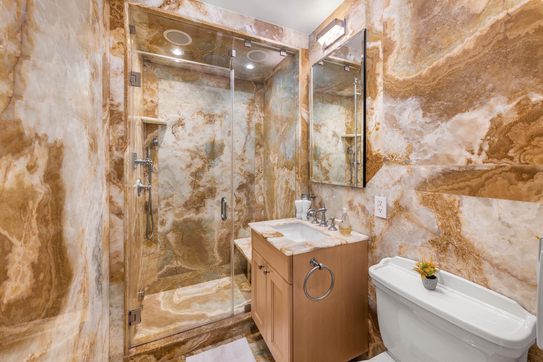 330 East 72nd Street, Unit 9/10 Manhattan, NY 10021 - Photo 8 of 17 a bathroom with a sink a toilet and shower