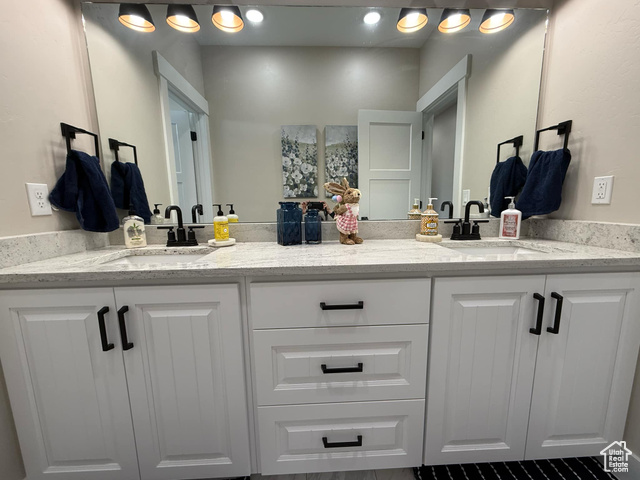 1240 West 2360 North Helper, UT 84526 - Photo 63 of 79 Bathroom featuring double vanity and a sink