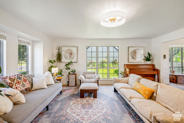 Undisclosed Address Alpine, UT 84004 - Photo 1 of 1 Living area featuring wood finished floors and baseboards