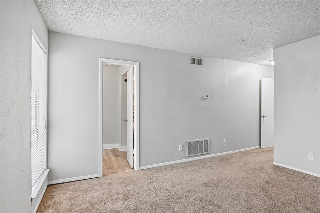5534 Boca Raton Boulevard, Unit 292 Fort Worth, TX 76112 - Photo 24 of 31 a view of an empty room