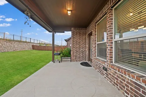 a view of a porch with a garden