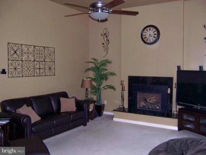 5957 Sandy Ridge Elkridge, MD 21075 - Photo 12 of 30 Gas Fireplace in Step-Down Family Room