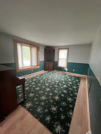 a bedroom with window