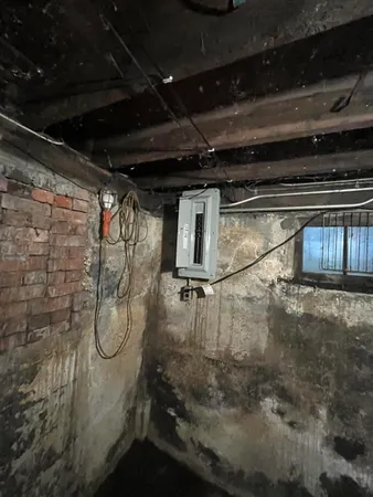 a kitchen with stainless steel appliances a sink stove and refrigerator