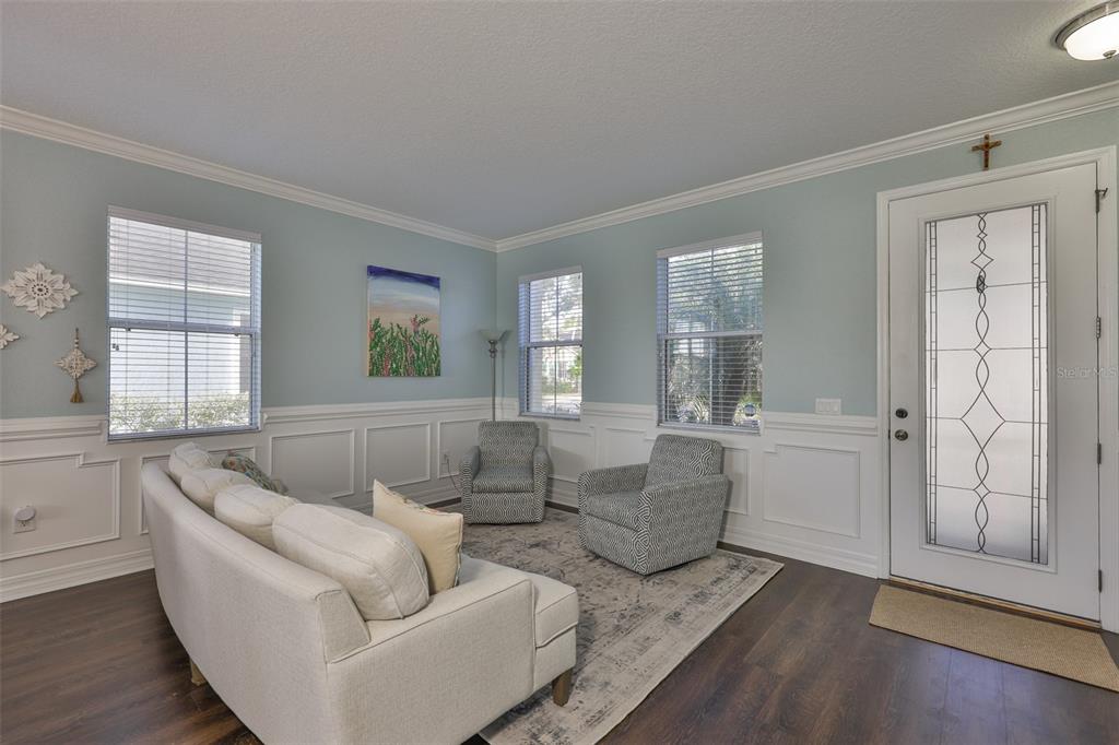 5409 Hammock View Lane Apollo Beach, FL 33572 - Photo 15 of 68 a living room with furniture and wooden floor