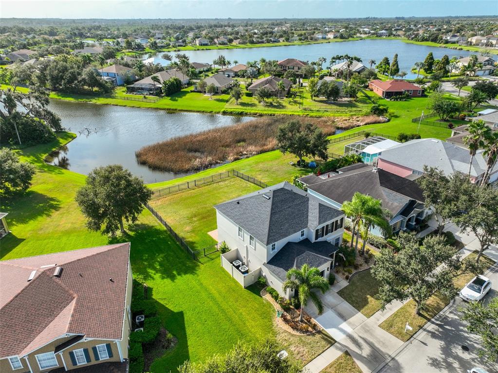 5409 Hammock View Lane Apollo Beach, FL 33572 - Photo 49 of 68 an aerial view of residential houses with outdoor space and lake view