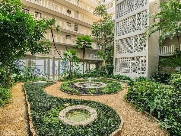 a view of a house with a sink and garden