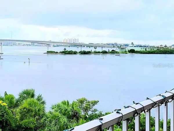 a view of a lake with a city