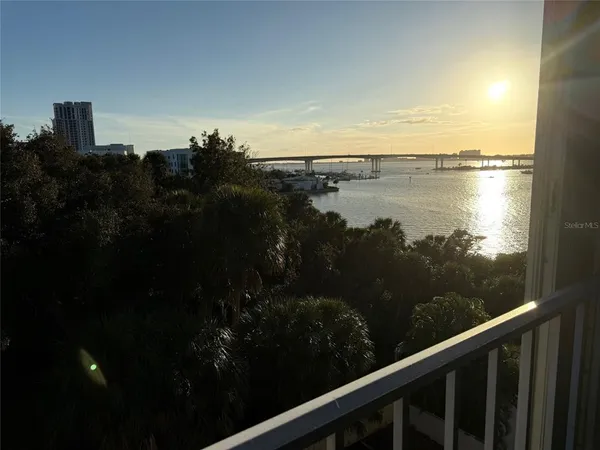 a view of a lake from a balcony
