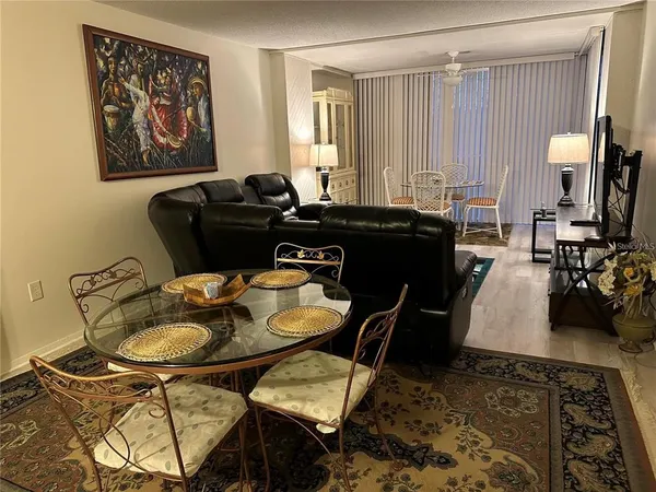 a bed room with furniture and wooden floor
