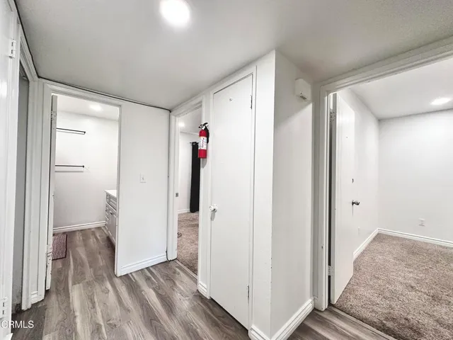 a view of entryway with wooden floor