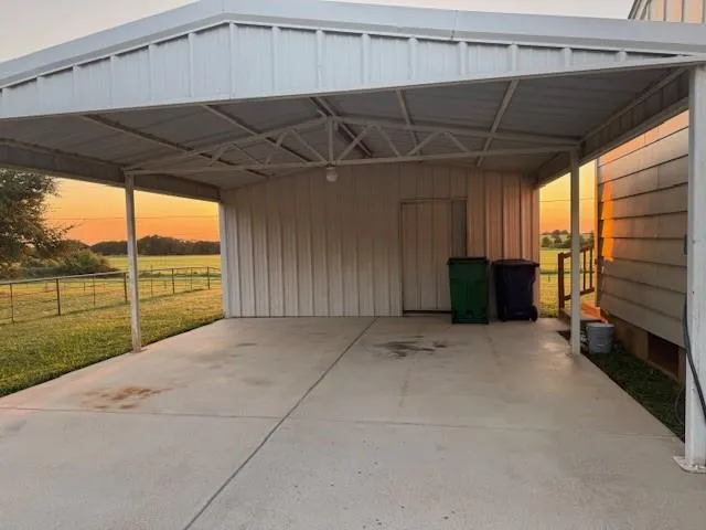 a view of a yard with an outdoor space