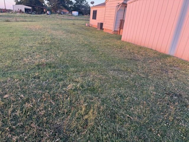 1001 Fortenberry Road Decatur, TX 76234 - Photo 15 of 15 a view of a yard with an outdoor space