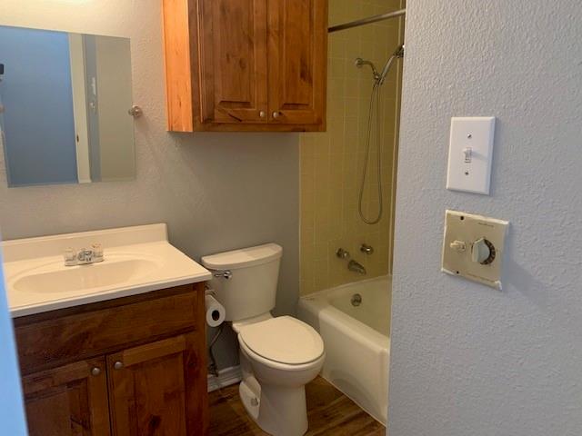 1001 Fortenberry Road Decatur, TX 76234 - Photo 8 of 15 a bathroom with a sink toilet and shower