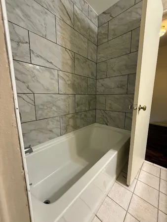a bathroom with a bathtub