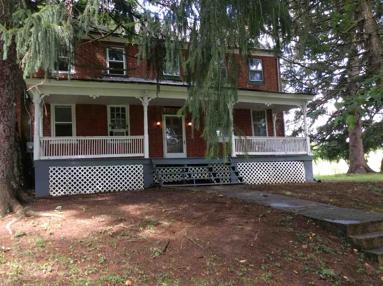 322 Smoky Row Road Staunton, VA 24401 - Photo 11 of 37 a front view of a house with a yard and a fence