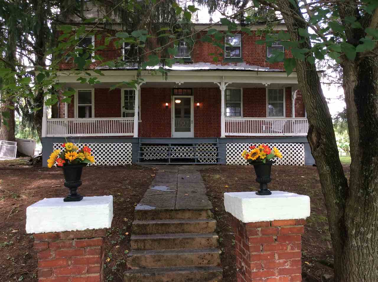 322 Smoky Row Road Staunton, VA 24401 - Photo 12 of 37 a front view of a house with a fountain