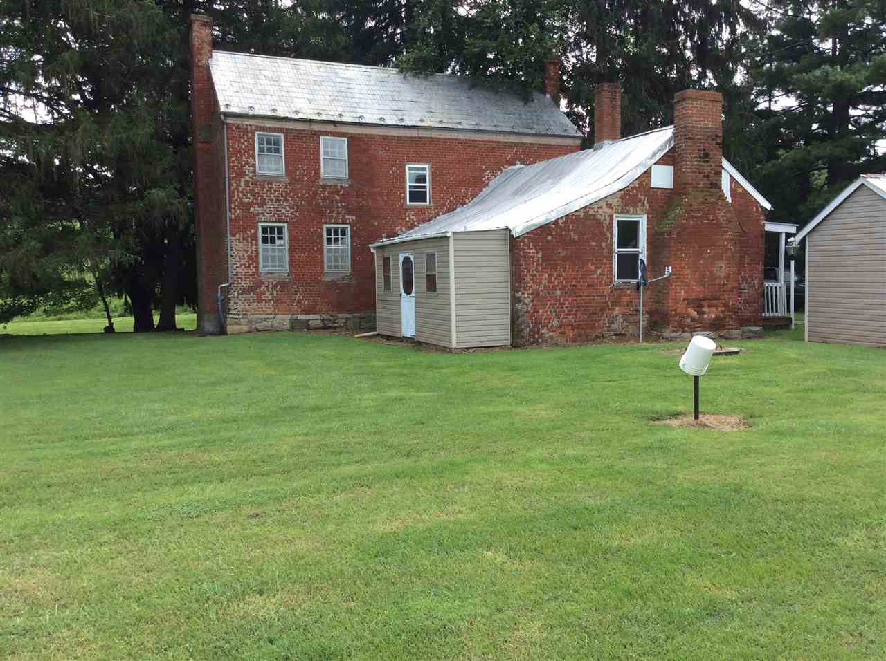 322 Smoky Row Road Staunton, VA 24401 - Photo 2 of 37 a front view of a house with a garden