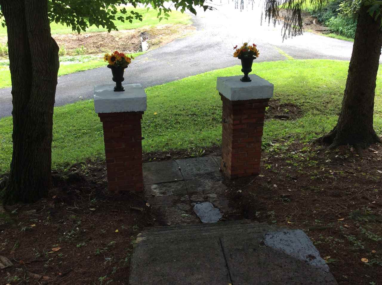 322 Smoky Row Road Staunton, VA 24401 - Photo 21 of 37 a view of a garden with a fountain
