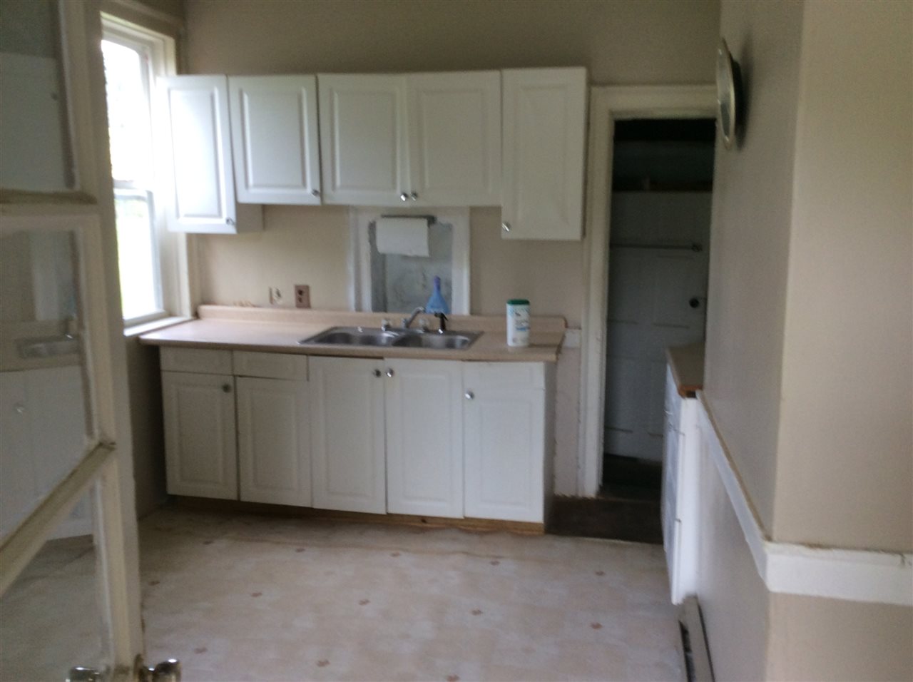 322 Smoky Row Road Staunton, VA 24401 - Photo 23 of 37 a kitchen with a sink and cabinets