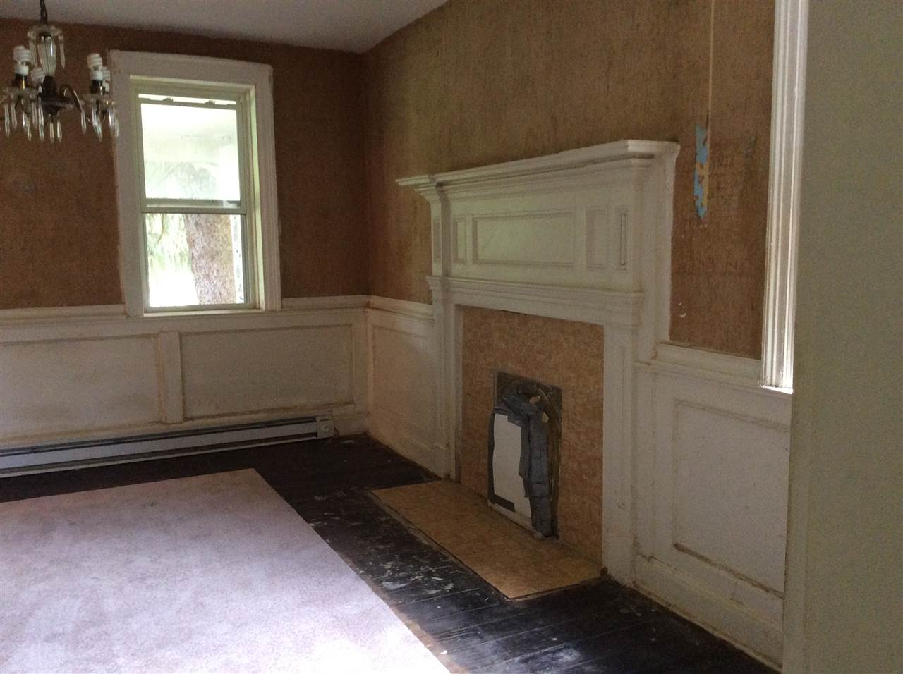 322 Smoky Row Road Staunton, VA 24401 - Photo 26 of 37 a room with a fireplace and a window