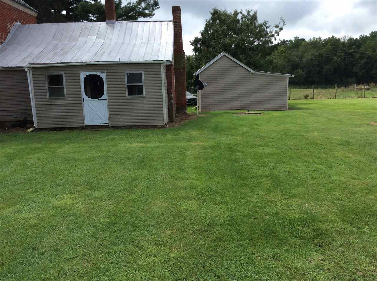 322 Smoky Row Road Staunton, VA 24401 - Photo 6 of 37 a view of a backyard with potted plants and large tree