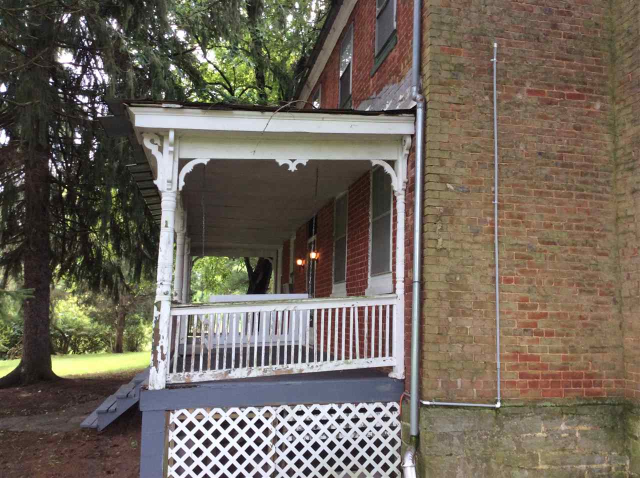 322 Smoky Row Road Staunton, VA 24401 - Photo 8 of 37 a view of a balcony with a swing