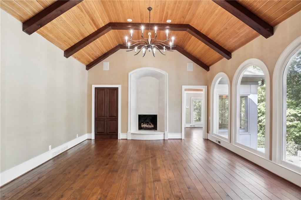 1965 West Wesley Road Northwest Atlanta, GA 30327 - Photo 12 of 34 a view of an entryway with wooden floor