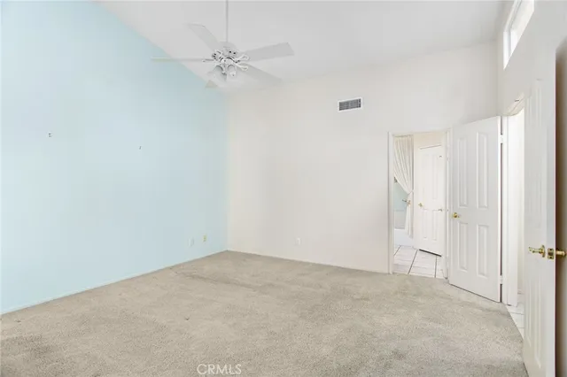 a view of an empty walk in closet