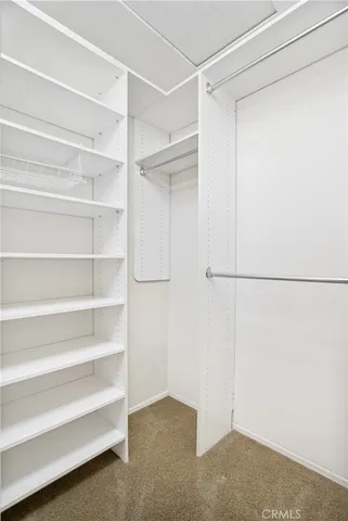 a view of an empty walk in closet
