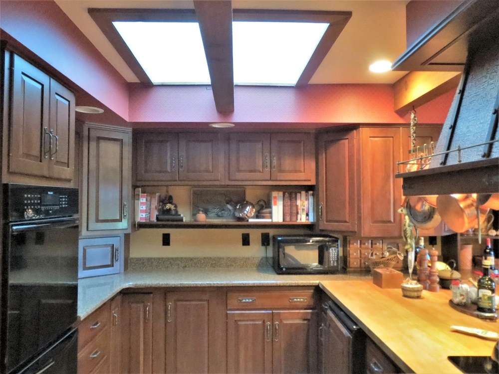 878 Riverside Drive Dixon, IL 61021 - Photo 12 of 45 a kitchen with stainless steel appliances a sink dishwasher a stove a refrigerator cabinets and a counter top space