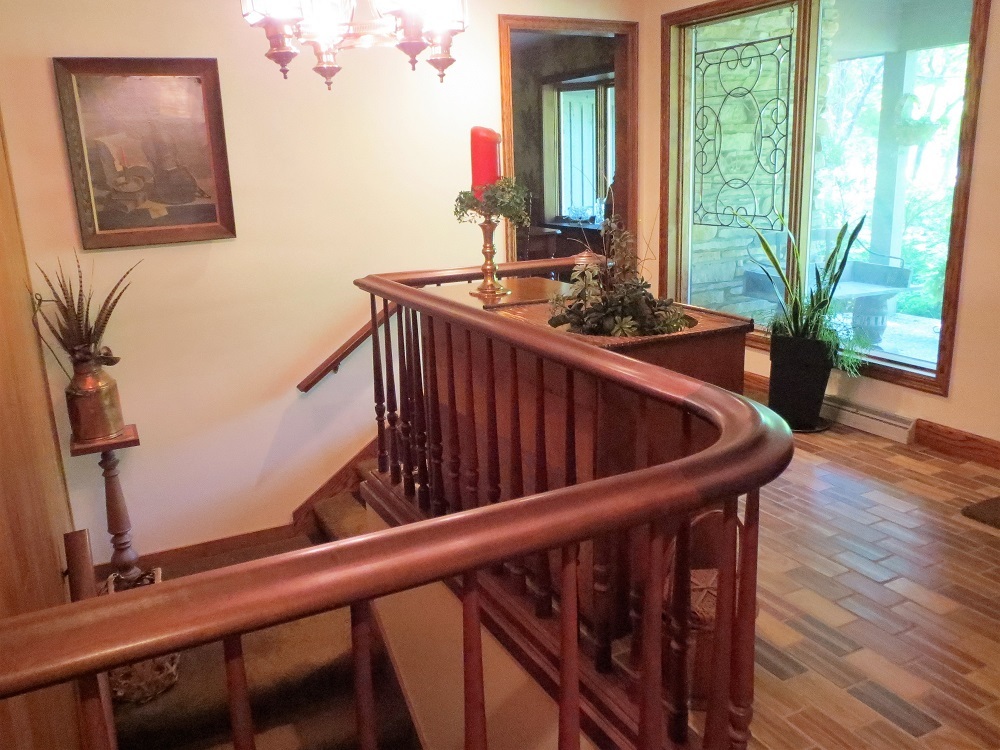 878 Riverside Drive Dixon, IL 61021 - Photo 3 of 45 a view of balcony with furniture and wooden floor