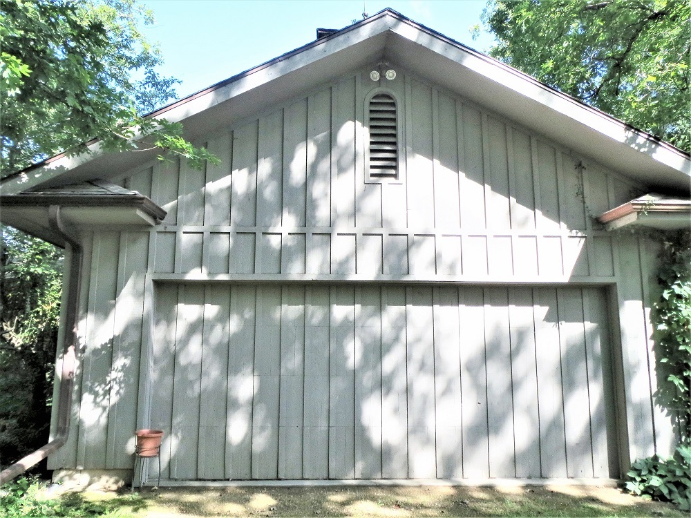 878 Riverside Drive Dixon, IL 61021 - Photo 43 of 45 a side view of a house with a yard