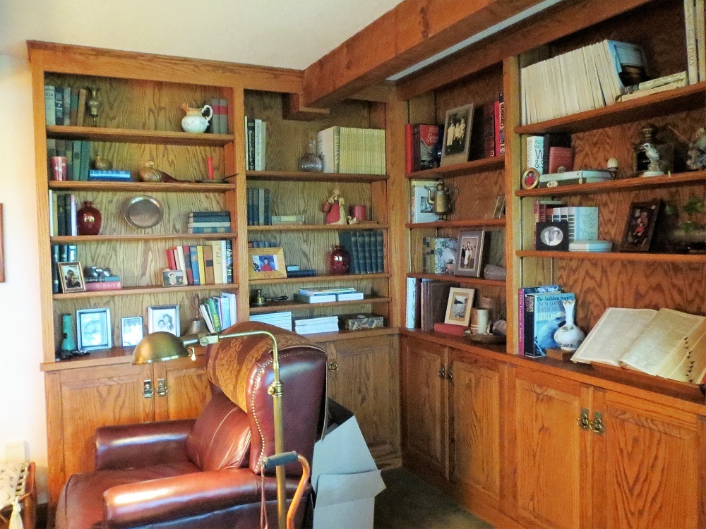878 Riverside Drive Dixon, IL 61021 - Photo 8 of 45 a living room with furniture cabinets and a book shelf