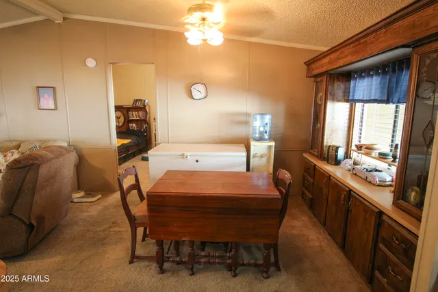 a bed room with a bed and a window