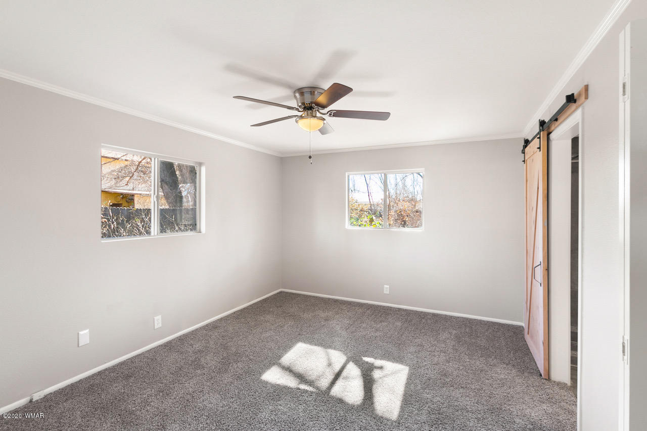 205 North 4th W Street Snowflake, AZ 85937 - Photo 11 of 24 a view of an empty room with a window