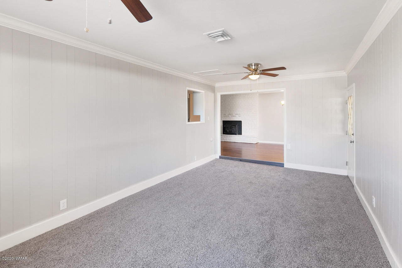 205 North 4th W Street Snowflake, AZ 85937 - Photo 5 of 24 wooden floor in an empty room