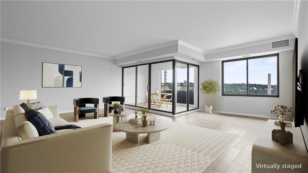 307 South Dithridge Street, Unit 810 Pittsburgh, PA 15213 - Photo 3 of 26 a living room with furniture and a large window