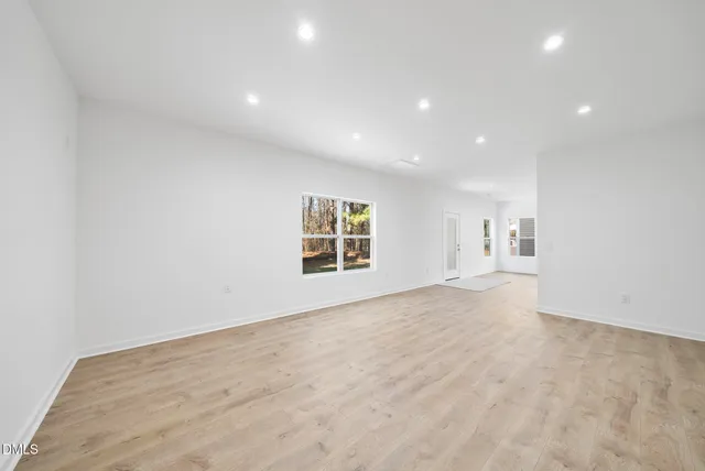 an empty room with windows