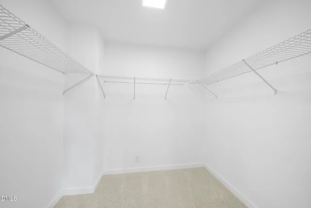 a view of a room with racks on the wall