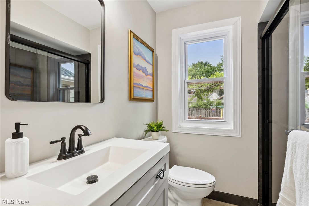 1407 Sunview Road Lyndhurst, OH 44124 - Photo 14 of 33 Bathroom with toilet and vanity