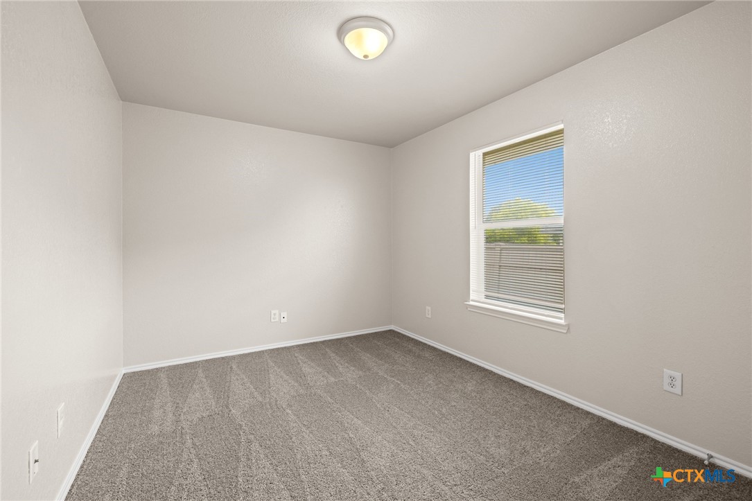 214 Timber Ridge Drive Nolanville, TX 76559 - Photo 22 of 31 an empty room with windows