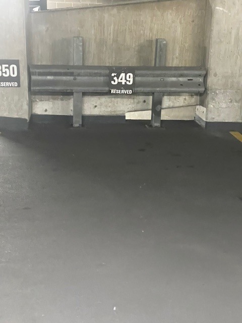 1122 North Clark Street, Unit P349 Chicago, IL 60610 - Photo 3 of 3 a kitchen with granite countertop a stove and a refrigerator